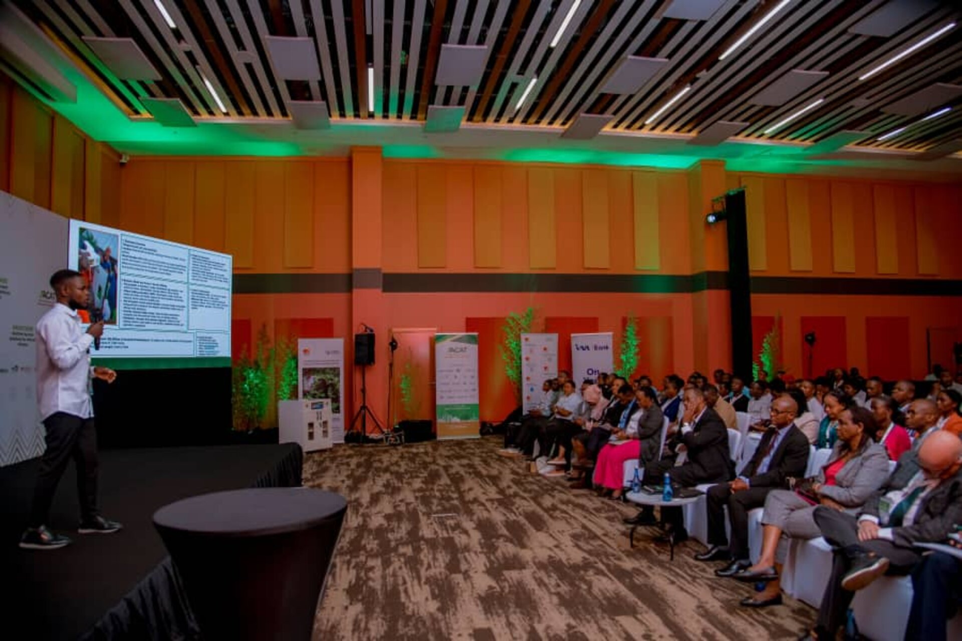 TechPlus Trust presenting on stage at an agricultural technology conference